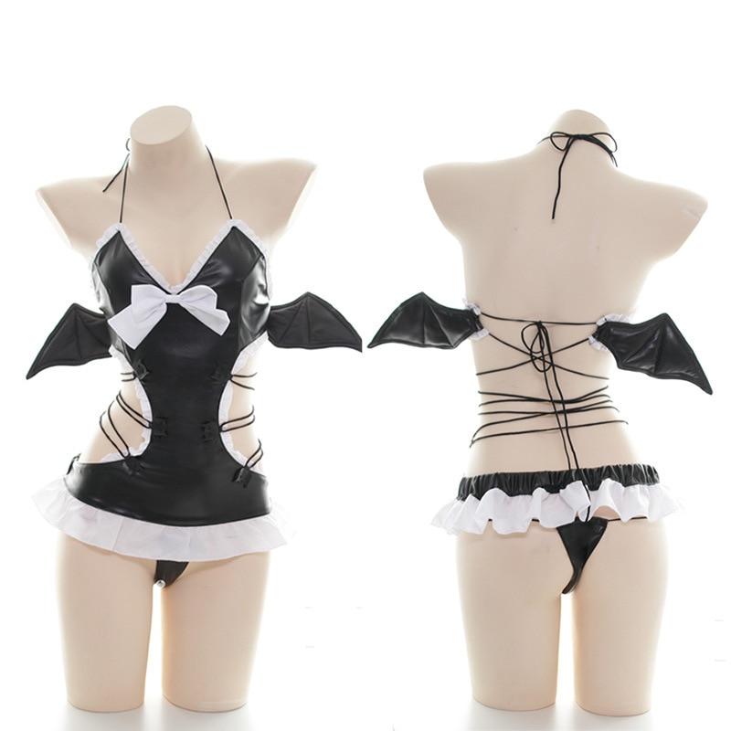 Front and rear mannequin views of the bat lingerie set showing the white bow, halter ties and open lace-up back.