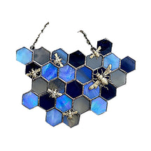 Bee and honeycomb stained glass hanging in the Blue Honeycomb design with cool-toned hexagons and bee accents.