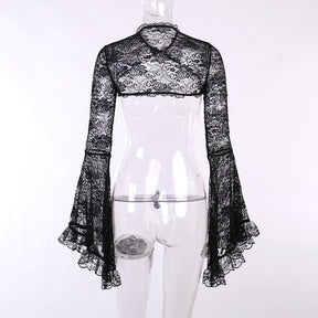 Back view of the black lace bolero on a clear mannequin, showing the short upper-back panel and long flared sleeves.