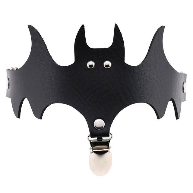 Black bat garter shown flat from the front, with the narrow band behind its outstretched wings.
