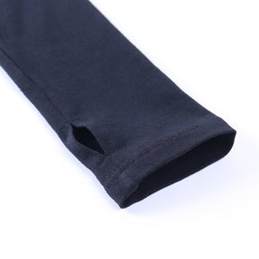 Black Blessed embroidered turtleneck crop top with a close view of a thumbhole cuff.