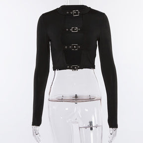 Additional front view of the black long sleeve crop top on a clear mannequin, showing the four buckles and curved edges along the opening.