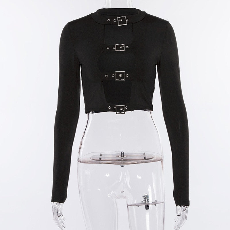 Additional front view of the black long sleeve crop top on a clear mannequin, showing the four buckles and curved edges along the opening.