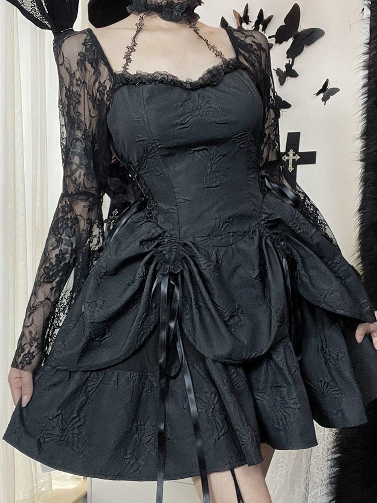 Black butterfly mini dress viewed from the front, with a fitted waist, shoulder lace and connecting choker straps. Ribbon ties gather the upper skirt panels.