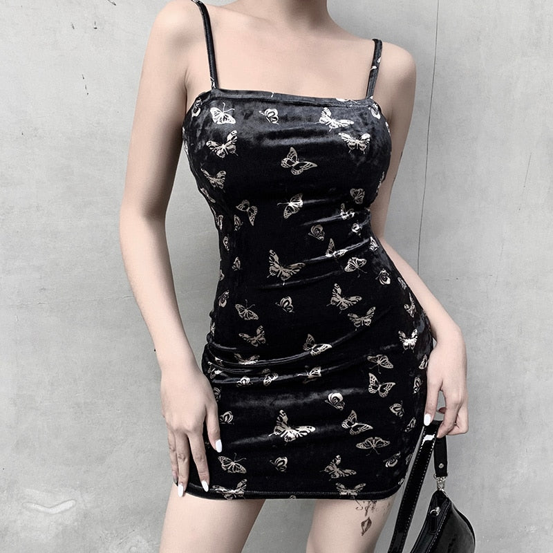 Black velvet butterfly-print mini dress shown in a straight-on front outfit view.
