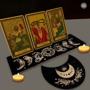 Black tarot stand pair with contrasting celestial artwork, showing one rectangle and one moon-shaped holder with narrow card slots.