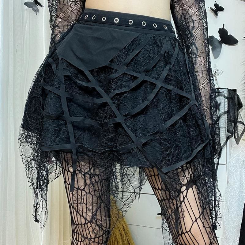 Asymmetric solid panel above the web overlay on a black gothic tutu skirt.