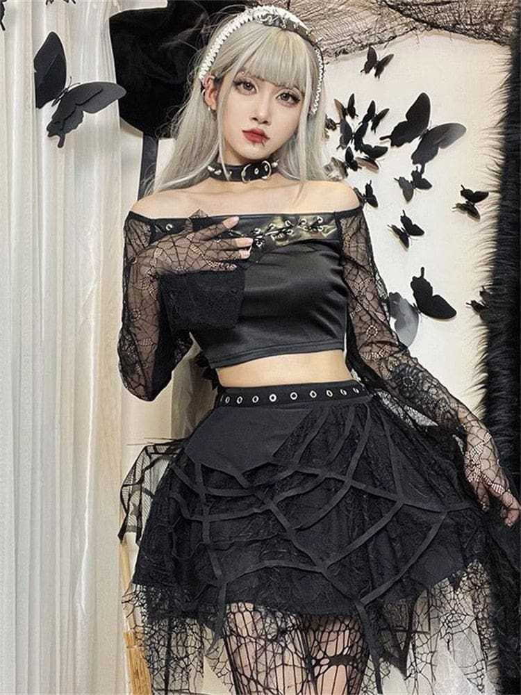 Layered black spiderweb skirt styled with an off-shoulder lace top beside butterfly wall decorations.
