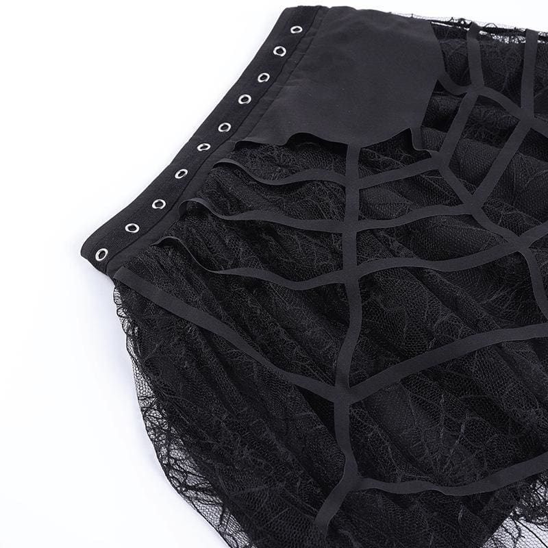 Close-up of the black fabric web layered over fine net lace on the tutu skirt.