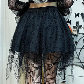Back view of the black skirt showing its gathered elastic waistband and trailing web lace.