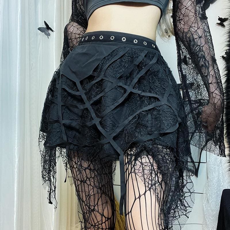 Black tutu skirt worn at the waist, showing overlapping lace layers and uneven web points.