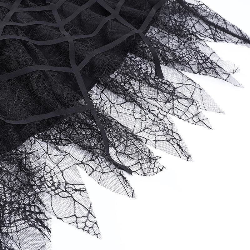 Detailed view of the uneven sheer lace points and thicker cutout web strips on the skirt.