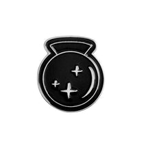 Black crystal-ball enamel pin with silver-tone outlines and three small star shapes inside the round orb.