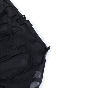 Black distressed mesh mini dress with a close view of the torn-looking fabric edges.