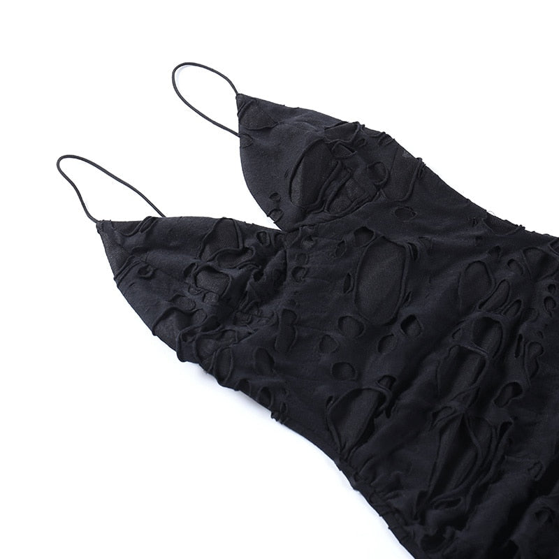 Black distressed mesh mini dress with the bodice laid flat.