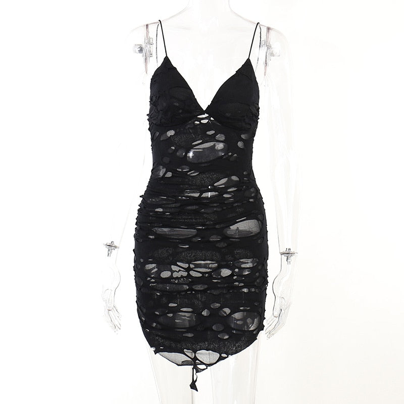 Black distressed mesh mini dress displayed from the front on a mannequin.