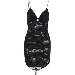 Black distressed mesh mini dress shown as a full garment on white.