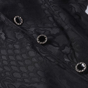 Close-up of round black decorative buttons with bright rim details against the cheongsam's black-on-black dragon and scale pattern.