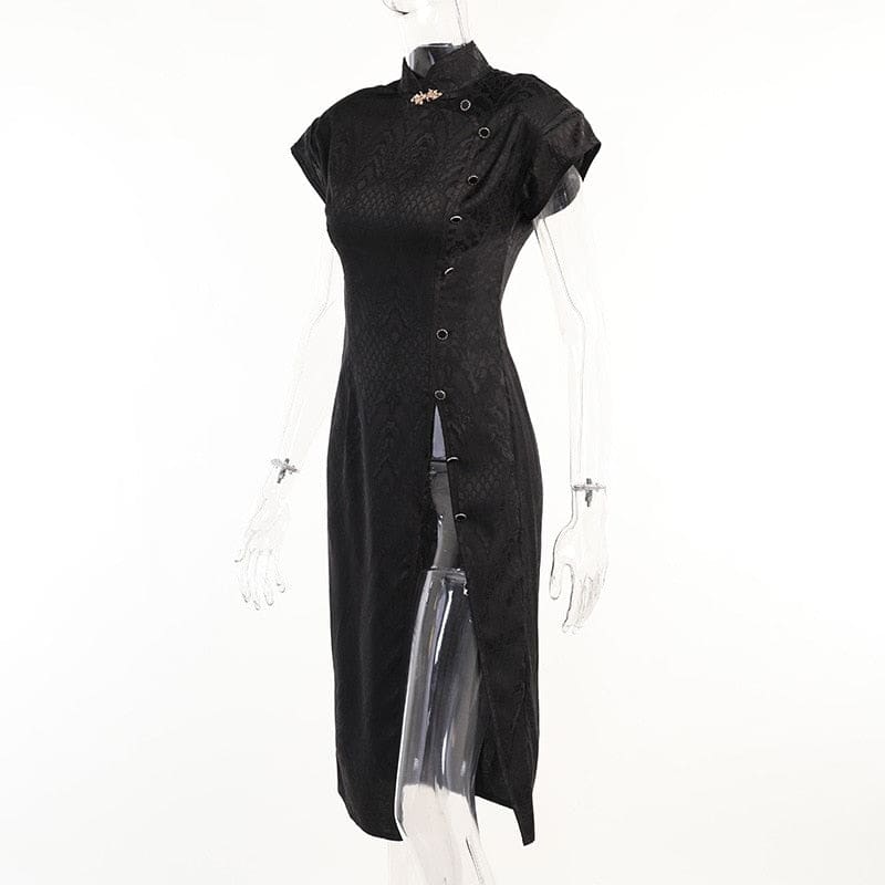 Angled product view of the black dragon-pattern cheongsam on a clear mannequin, showing the long skirt and open side below the buttons.