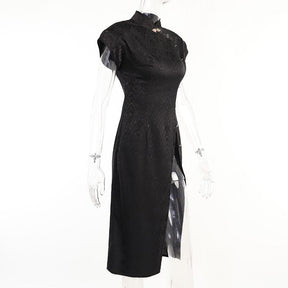 Three-quarter mannequin view of a black cheongsam dress, emphasizing the fitted waist, short sleeves and raised collar.