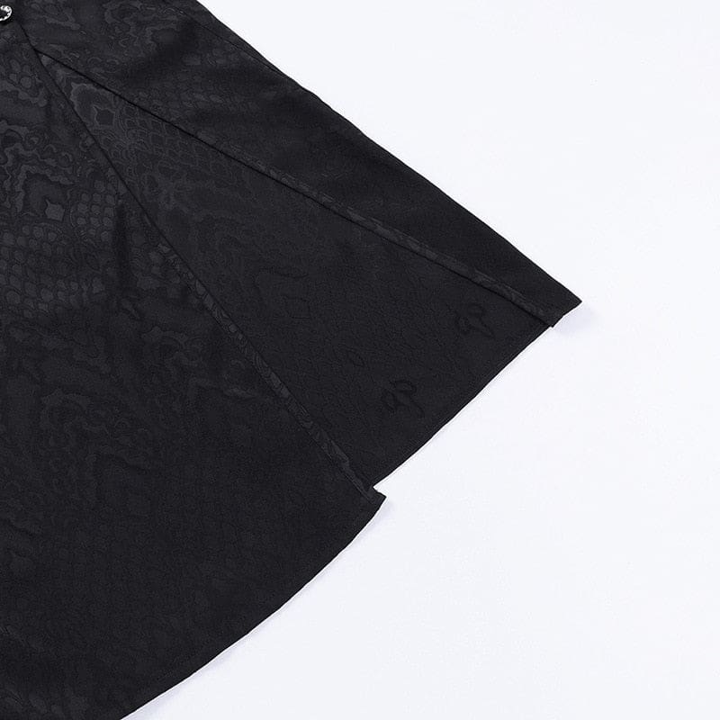Close detail of the black cheongsam skirt fabric and stitched edges at the high side opening.