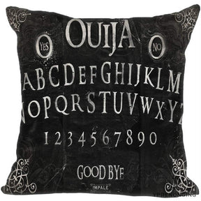Black square Ouija pillow cover with pale serif alphabet rows, numbers, Yes and No medallions and fine scrollwork around the corners.