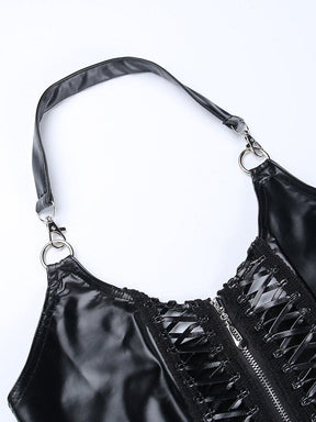 Flat close-up of the black halter strap clipped to two silver-tone rings, above the crop top’s curved neckline and zip-front laced panels.