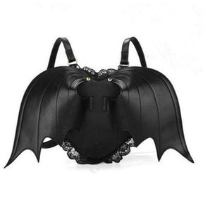 Black bat wing backpack with curved wing stitching, lace trim, a zip closure, and buckle shoulder straps.