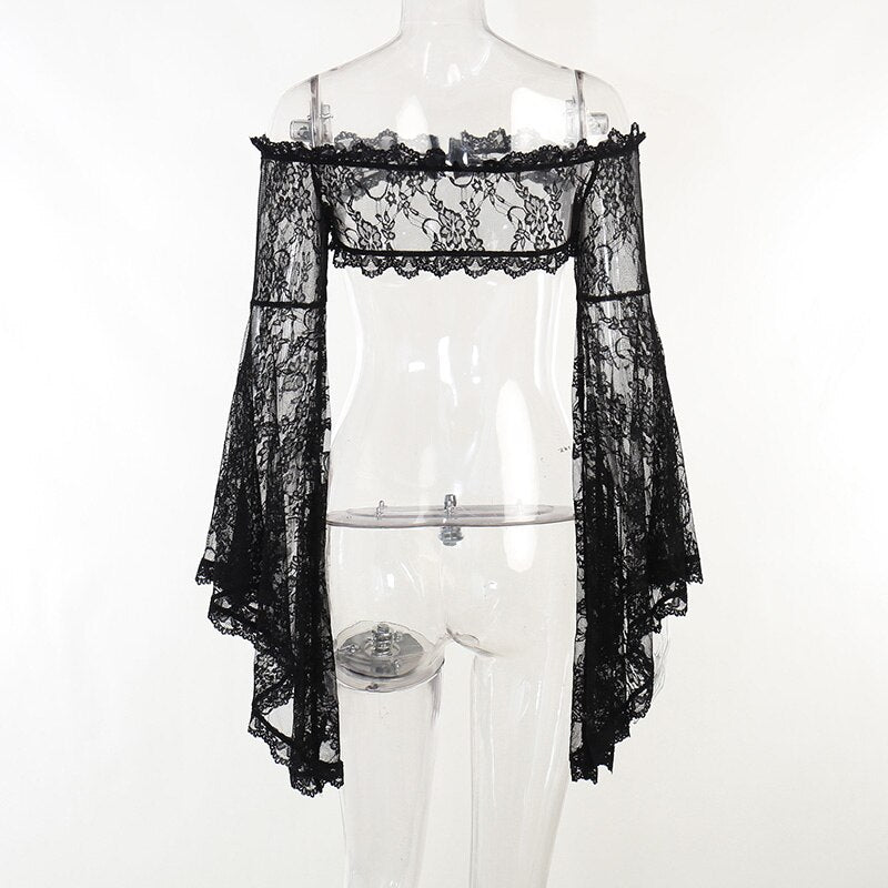 Back view of the off-shoulder lace overlay on a clear mannequin, with the narrow lace band spanning the upper back.