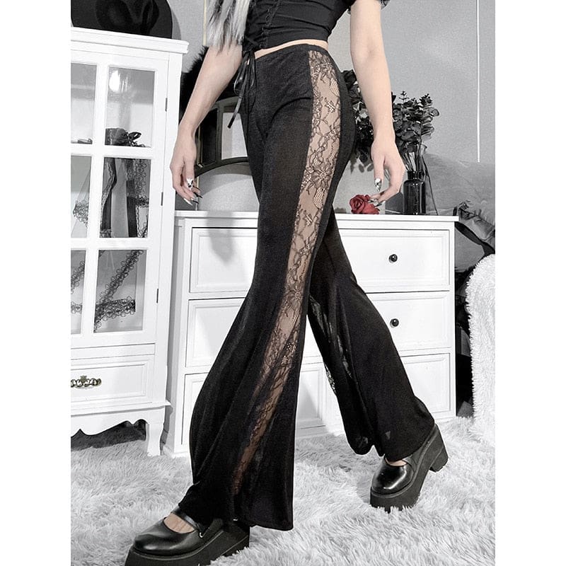 Black lace-panel bell bottoms shown with one foot behind the other, revealing the sheer side insert and draped flare.