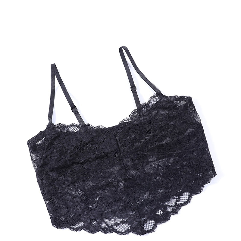 Separate black lace camisole laid flat on white, with thin adjustable straps, a floral pattern and scalloped hem. This styling item is not included with the overlay.