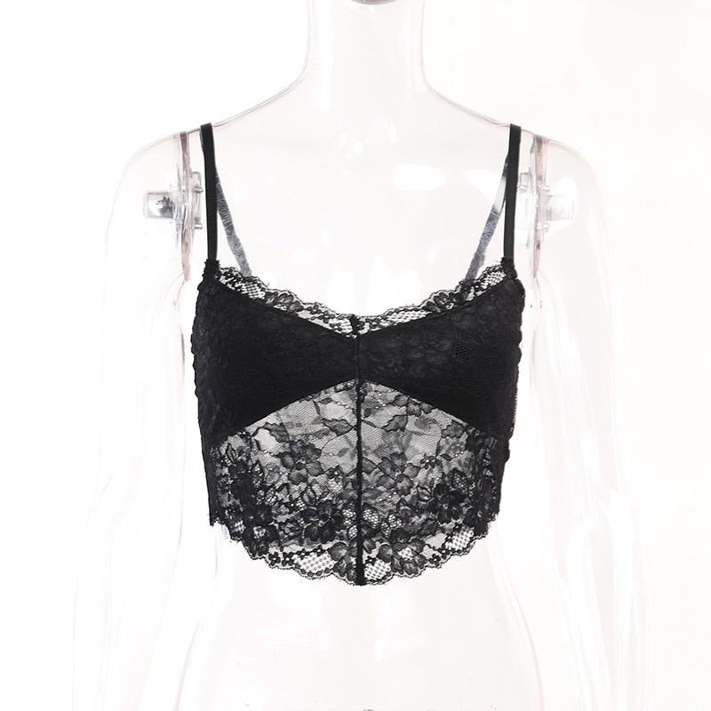 Separate black lace camisole displayed on a clear mannequin, showing thin straps and a scalloped floral hem. It is not included with the velvet bolero.