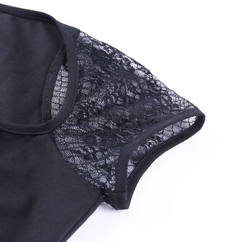 Flat close-up of a floral mesh cap sleeve, showing the sheer pattern and narrow black binding beside the opaque body.