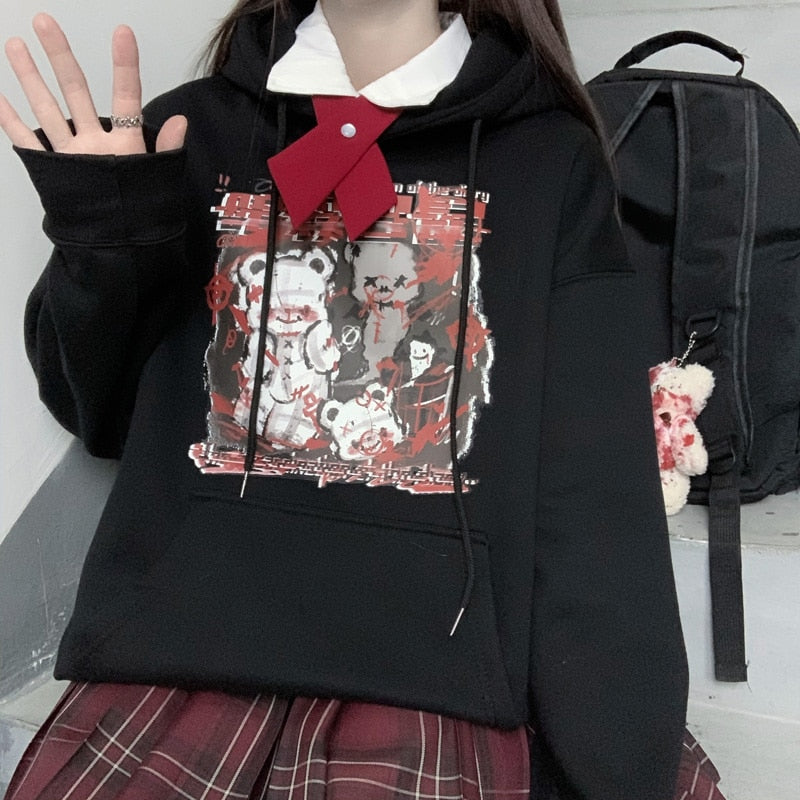 Black Menhera bear graphic hoodie with a close view of the bear collage and drawstrings.