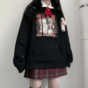 Black Menhera bear graphic hoodie shown in a straight-on outfit with a separate collared layer.