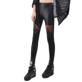 Black leather-look leggings with ornate mesh thigh panels and lower-leg lacing shown in a front outfit with separate black shoes.