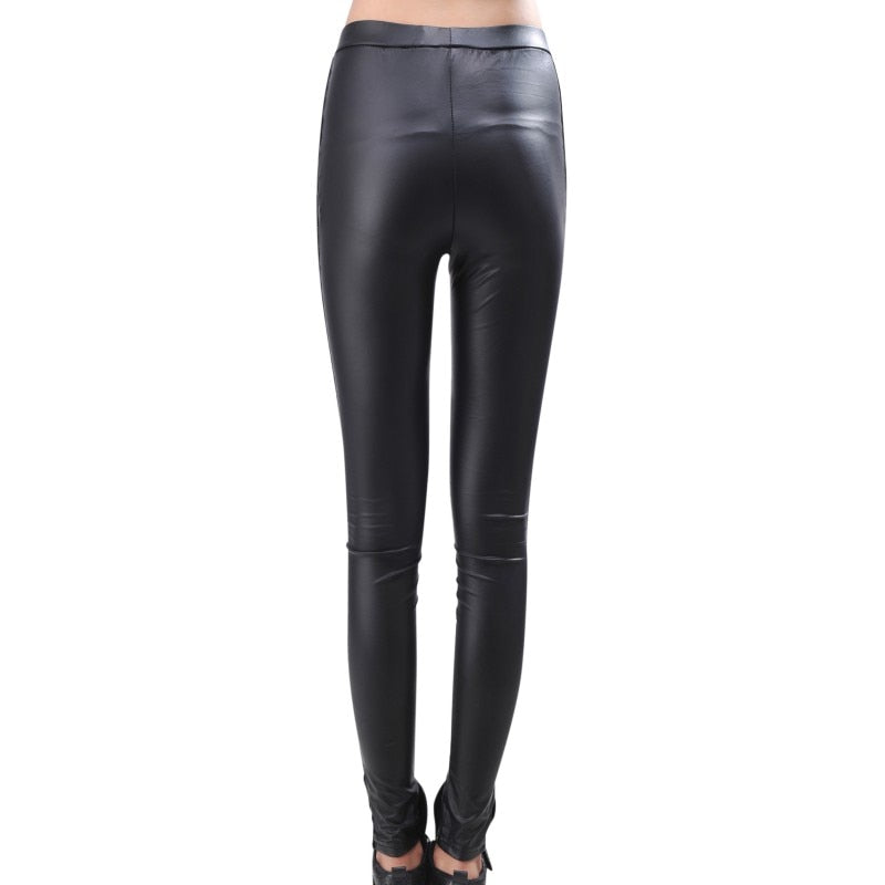 Black leather-look leggings with ornate mesh thigh panels and lower-leg lacing displayed from the back with smooth black panels.