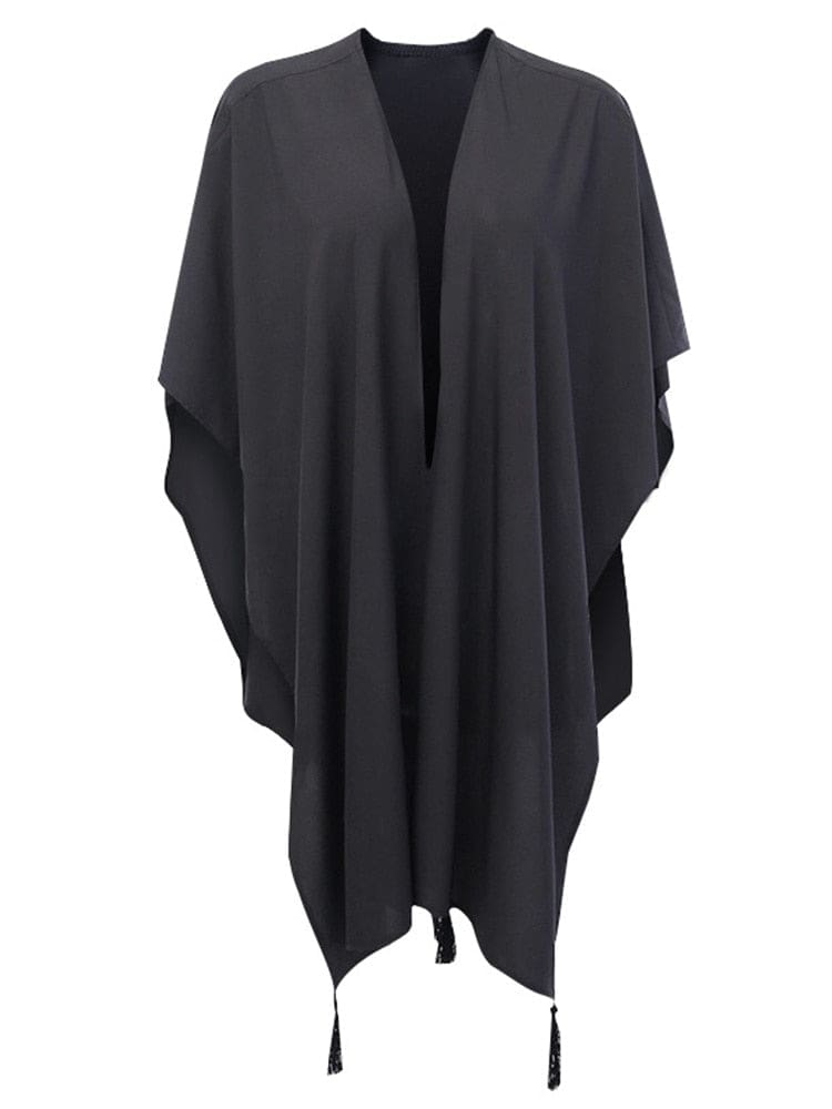 Black open-front shawl isolated on white with long pointed ends and small tassels.