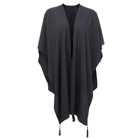 Plain open front of the black lunar shawl with draped sides and tassel trim.