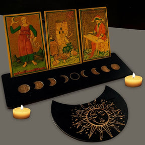 Black moon phase tarot stand pair viewed together, with cards above the long rectangular holder and smaller crescent piece.