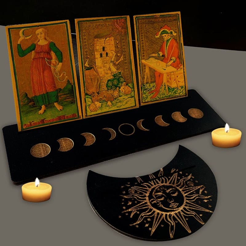 Black moon phase tarot stand pair viewed together, with cards above the long rectangular holder and smaller crescent piece.