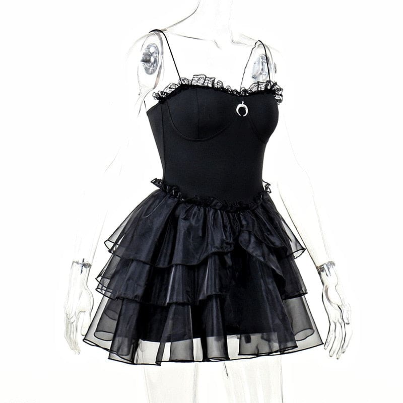 Three-quarter mannequin view of the black dress showing the fitted waist and flared layers of ruffles.