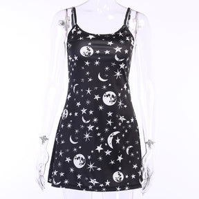 Black moon and star print mini dress displayed at a three-quarter angle.
