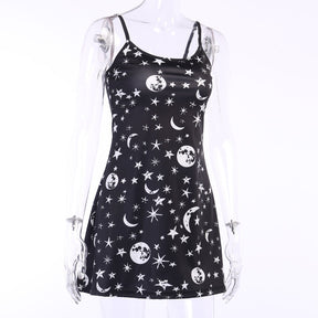 Black moon and star print mini dress shown in a second full mannequin view.