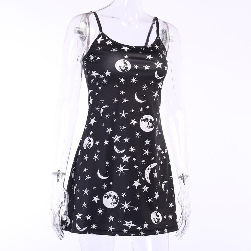 Black moon and star print mini dress shown in a second full mannequin view.