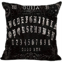 Black square Ouija pillow cover with decorative pale Gothic-style alphabet rows, fine curls and stars, and Yes, No and Good Bye lettering.