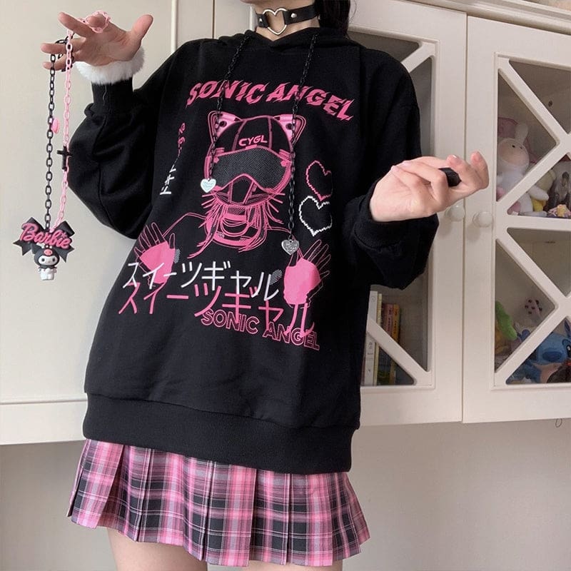 Front view of the black and pink graphic hoodie with chain drawstrings held beside the hood opening.