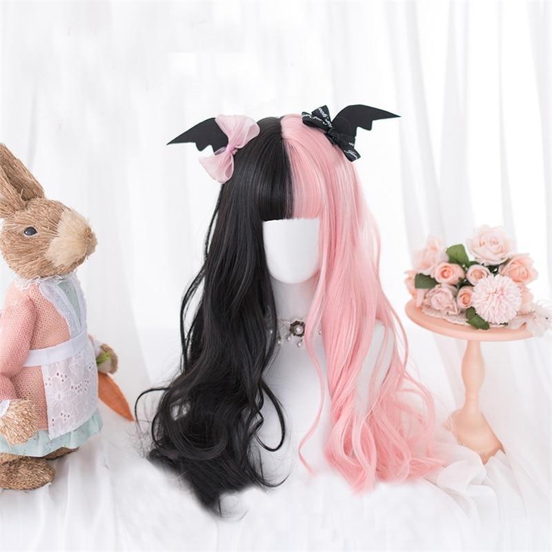 Long black and pastel pink split-color wig with full bangs and wavy lengths, displayed on a mannequin.