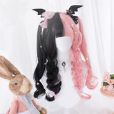 Long black and pastel pink split-color wig with full bangs and wavy lengths, displayed on a mannequin.
