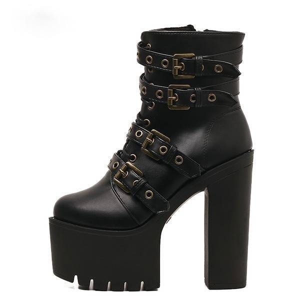 Side view of a black ankle boot showing four buckle straps, a thick front platform and a separate chunky heel.